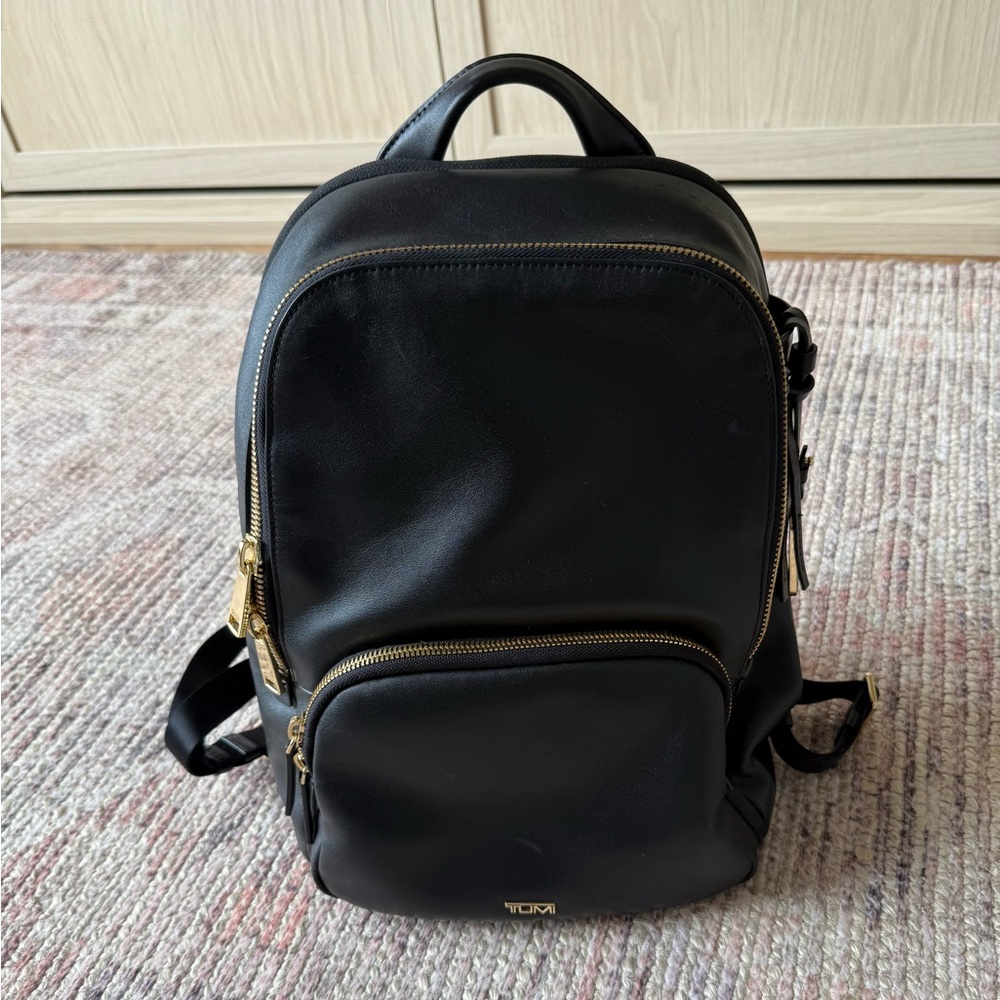Tumi Black Leather Backpack with Gold Details
